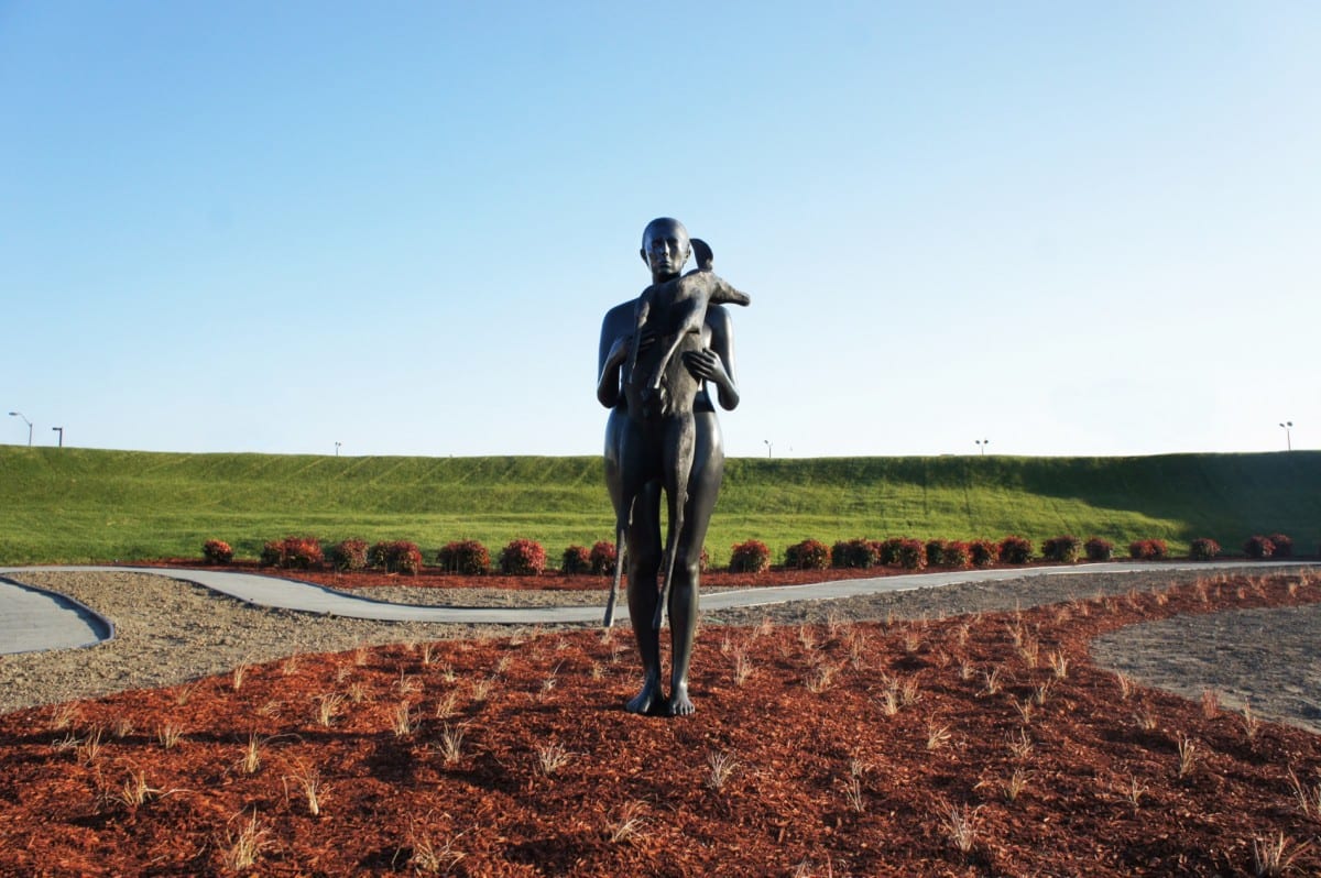 Kiki Smith’s Her, a life-sized self-portrait in bronze by Kiki Smith surrounded by a red-themed garden. Photograph by Layman Lee. 