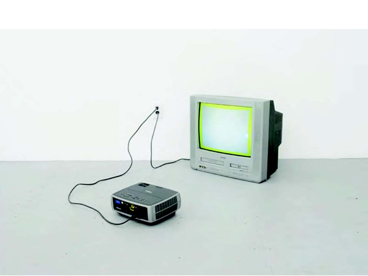 Carlos Jiménez Cahua, Untitled #72 (Native, blue output of a digital projector [i.e., one with no video input] pointed toward a television playing a loop of a video of pure yellow), digital projector, CRT television with DVD video dimensions variable, ed. of 3 + 1AP, 2013
