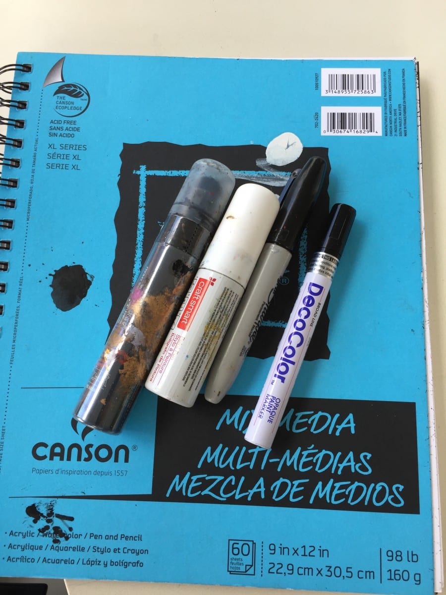 Notebook and drawing instruments. 